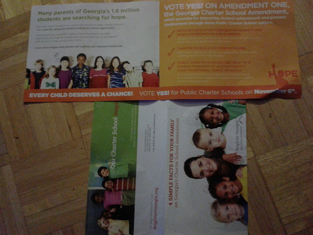 Two glossy mailers pushing the charter school amendment