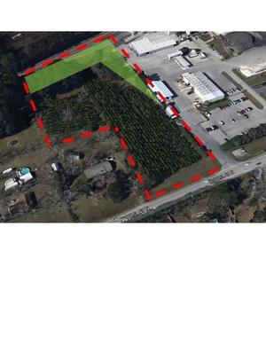 [Google map with red-dashed parcel]